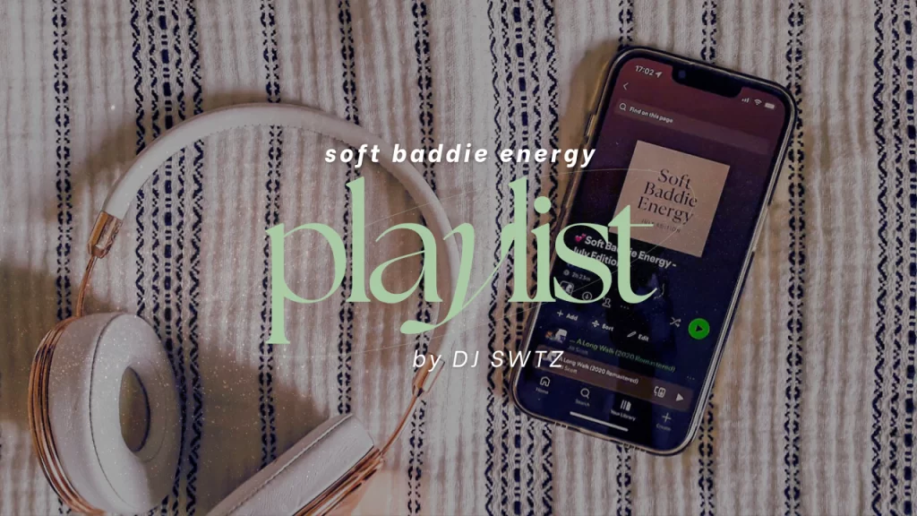 Overhead shot of a phone and headphones on a soft throw blanket