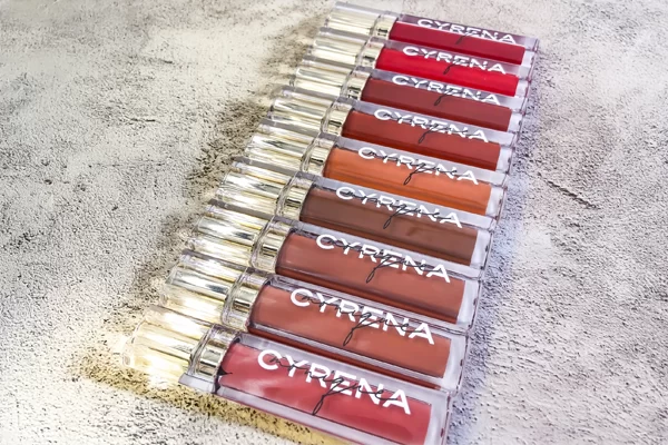Liquid matte lipsticks with aesthetic background